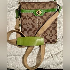 Authentic Signature Coach cross-body bag. Good Used condition. Can be cleaned